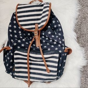 Star print Navy blue backpack great condition
